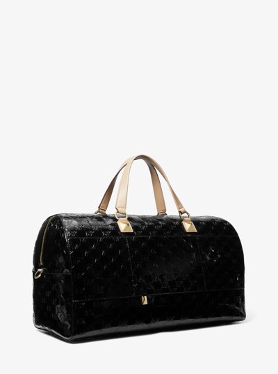 Grayson Extra-Large Logo Embossed Patent Weekender Bag in BLACK | Michael Kors