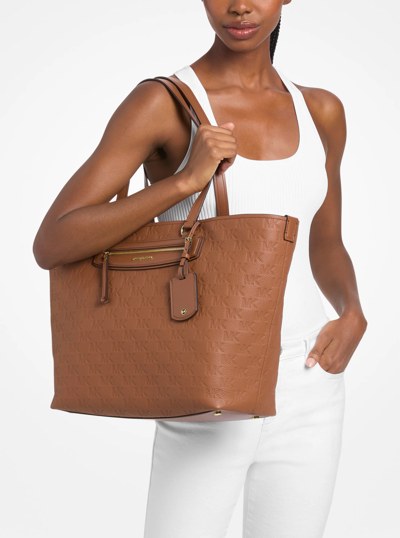 Jet Set Travel Extra-Large Logo Embossed Leather Tote Bag in LUGGAGE | Michael Kors