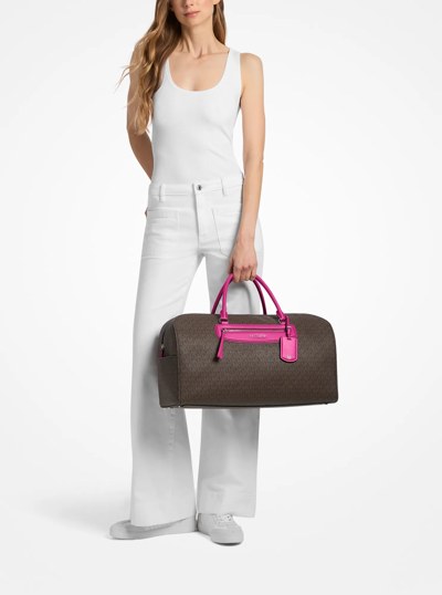 Jet Set Travel Extra-Large Signature Logo Weekender Bag in RASPBERRY | Michael Kors