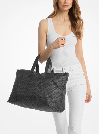 Tanner Large Printed Signature Logo Reversible Packable Tote Bag in BLACK | Michael Kors