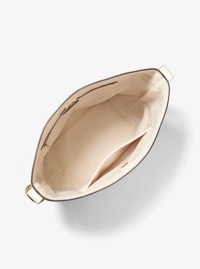 Nolita Large Pebbled Leather Bucket Tote Bag in EGGSHELL | Michael Kors