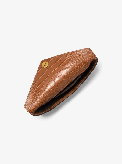 Mia Crocodile Embossed Leather Envelope Clutch in SADDLE | Michael Kors