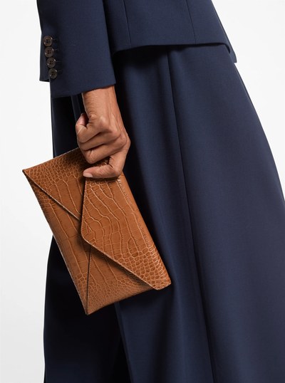 Mia Crocodile Embossed Leather Envelope Clutch in SADDLE | Michael Kors