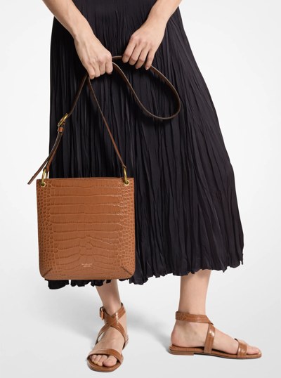 Tate Small Crocodile Embossed Patent Leather Crossbody Bag in SADDLE | Michael Kors
