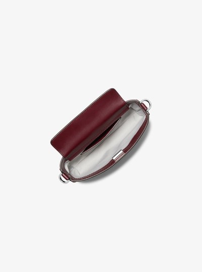 Bryant Small Metallic Signature Logo Convertible Pochette in OXBLOOD | Michael Kors