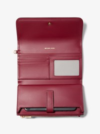 Bolso de pulsera Jet Set mediano convertible con logotipo exclusivo