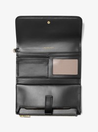 Pochette-bracelet pour t&eacute;l&eacute;phone intelligent Jet Set de taille moyenne en cuir grain&eacute;