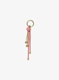 Colgante para bolso con cord&oacute;n en tono dorado y motas