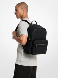 Sac &agrave; dos Jet Set de taille moyenne en cuir grain&eacute; et grav&eacute; &agrave; logo