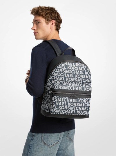 Sac &agrave; dos Cooper de taille moyenne &agrave; logo graphique in BLANC &Eacute;CLATANT | Michael Kors