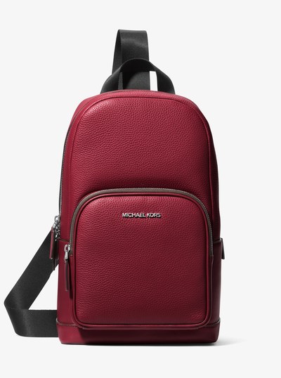 Cooper Pebbled Leather Sling Pack in CHERRY | Michael Kors