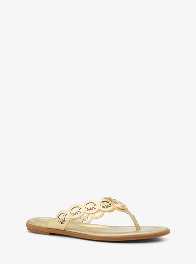 Janie Perforated Logo Metallic Leather Sandal in PALE GOLD | Michael Kors