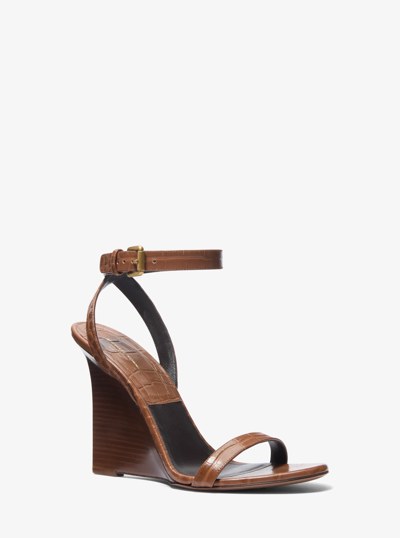 Claudia Crocodile Embossed Leather Wedge Sandal in SADDLE | Michael Kors