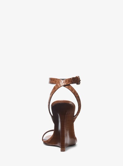 Claudia Crocodile Embossed Leather Wedge Sandal in SADDLE | Michael Kors
