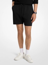 Short en m&eacute;lange de coton avec poche &agrave; logo