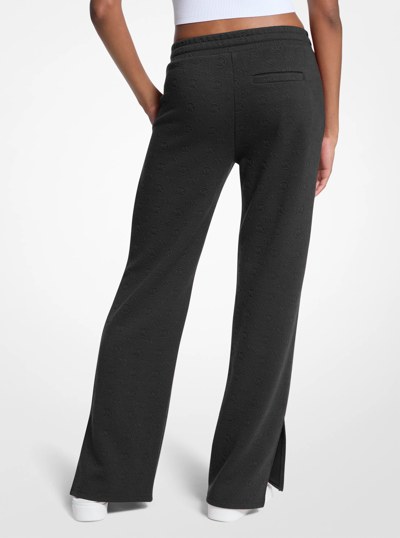 Pantalon tricot&eacute; en jacquard &agrave; logo in NOIR | Michael Kors