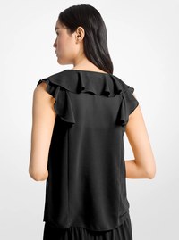 Blouse en cr&ecirc;pe georgette &agrave; volants