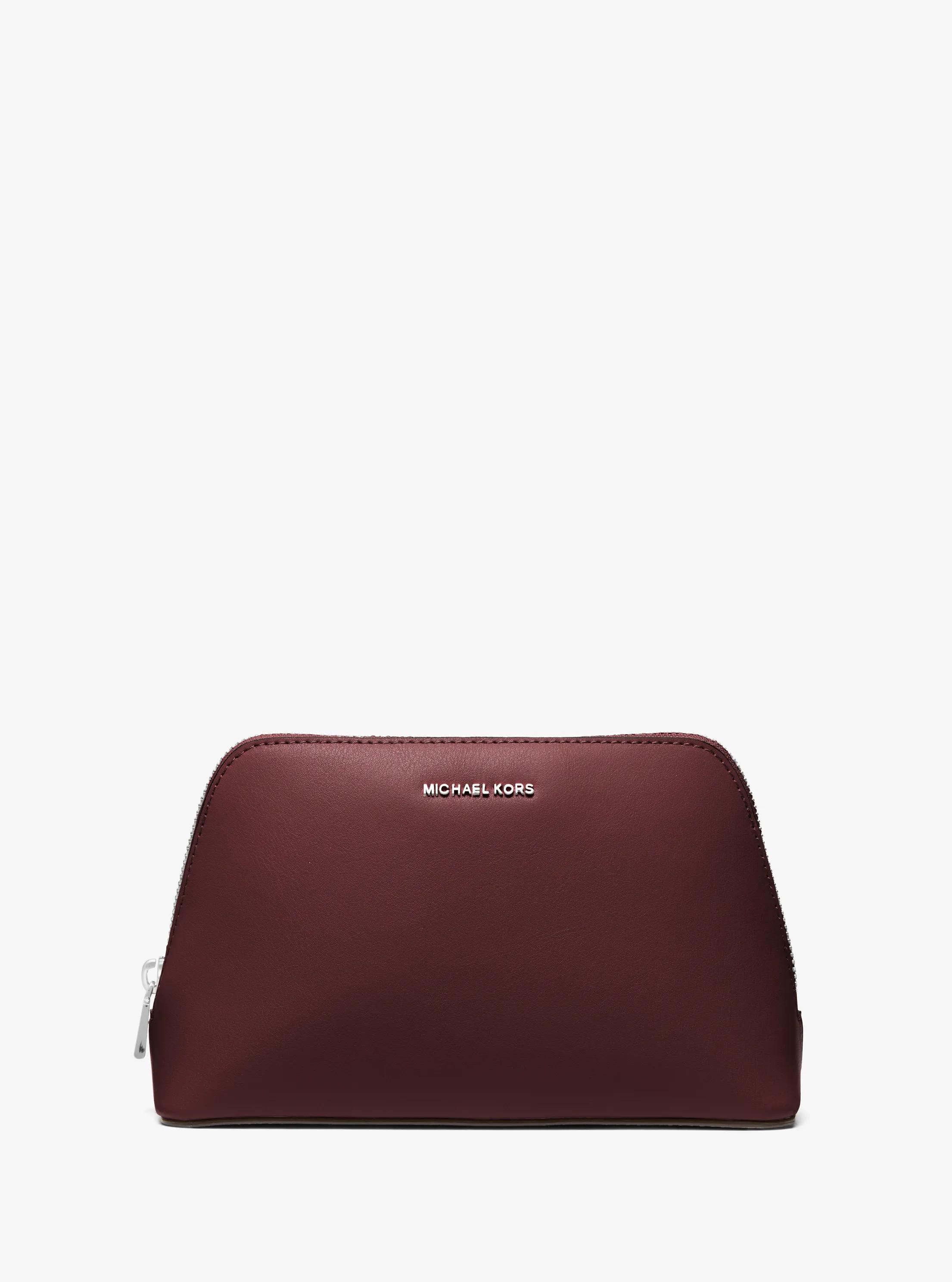 Neceser de viaje Jet Set mediano de piel in GUINDA | Michael Kors