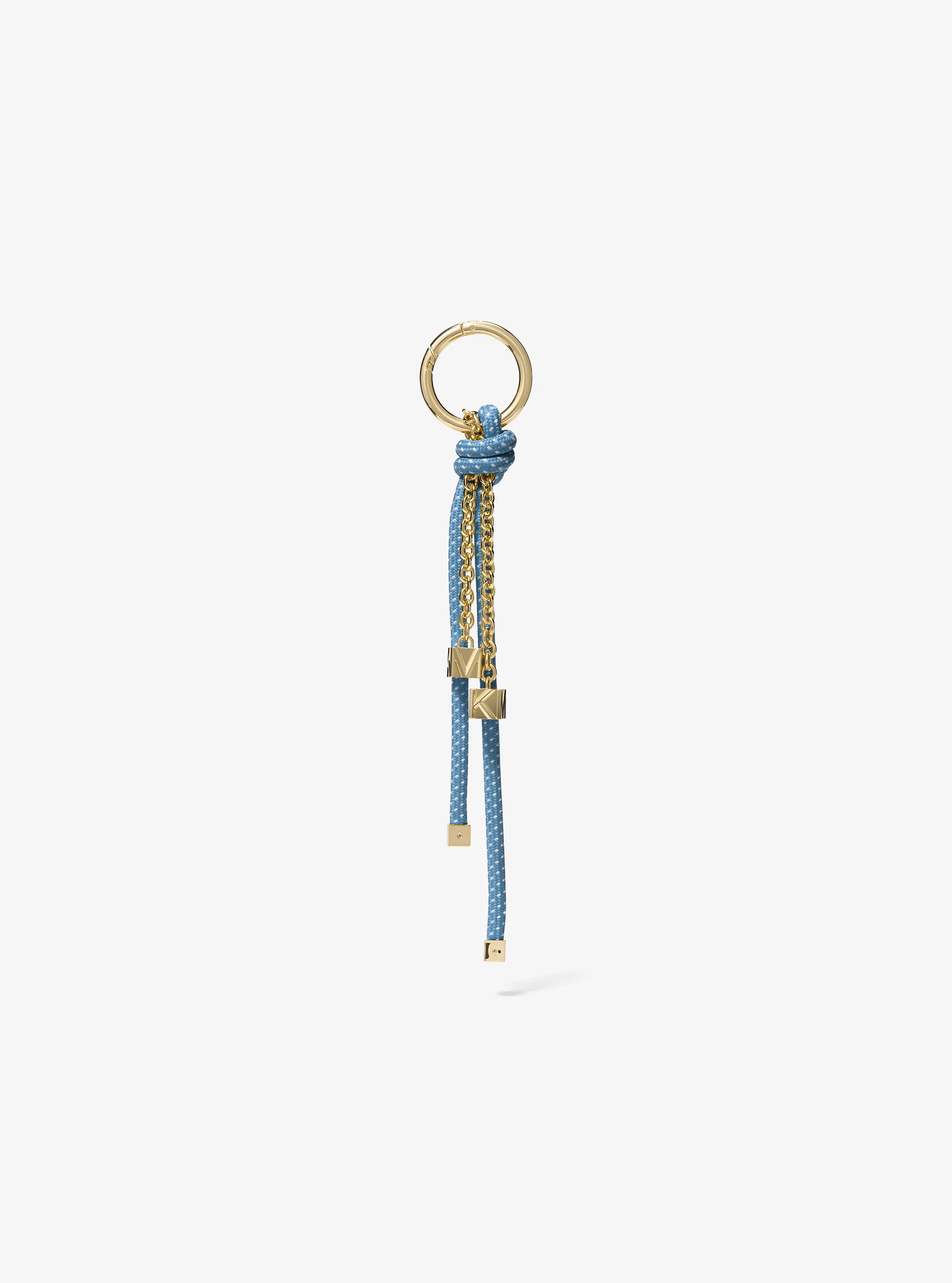 MK Breloque de sac dorée avec cordon moucheté - Bleu - Michael Kors