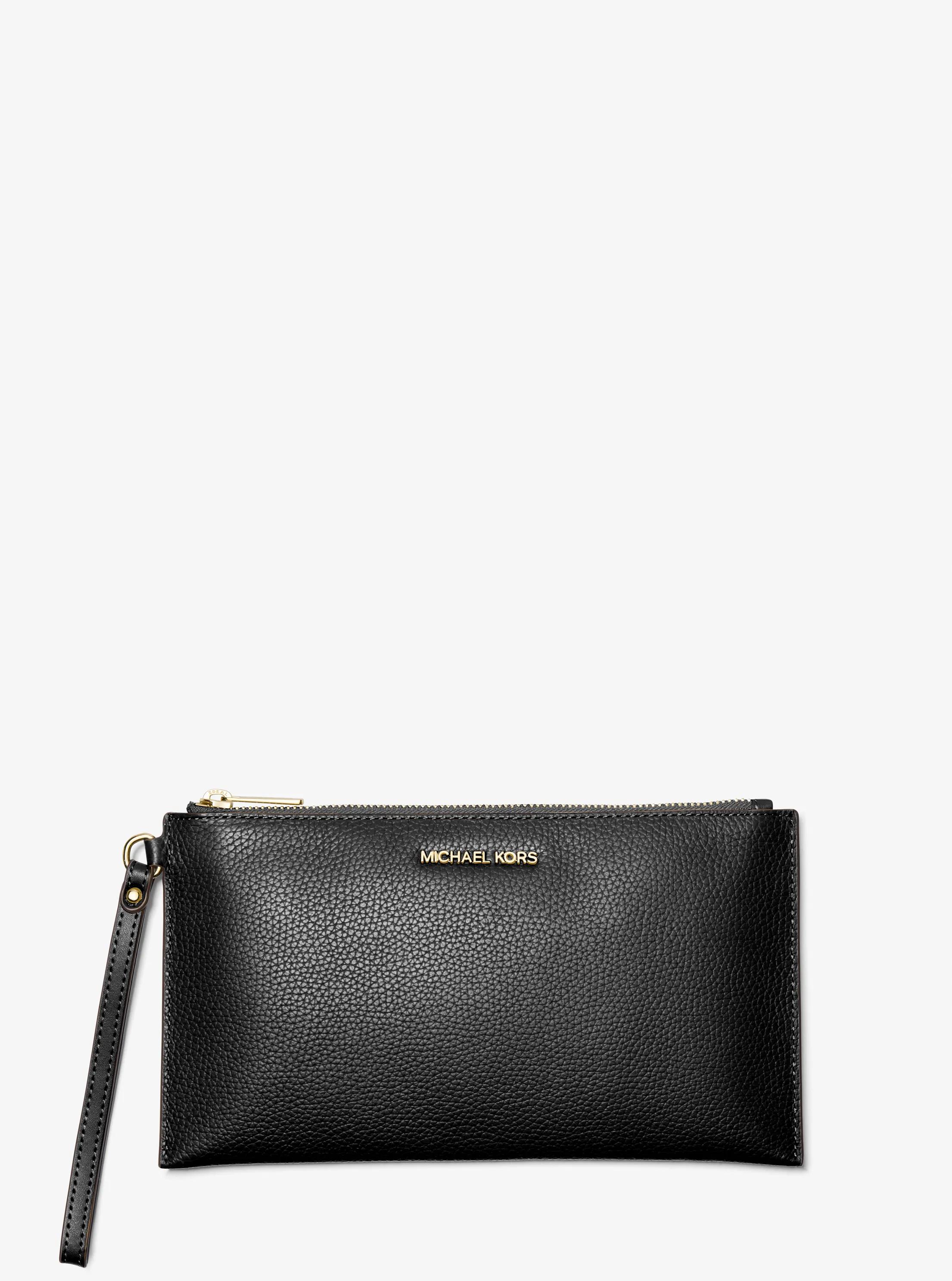 Grande pochette Jet Set Travel en cuir grain&eacute; in NOIR | Michael Kors