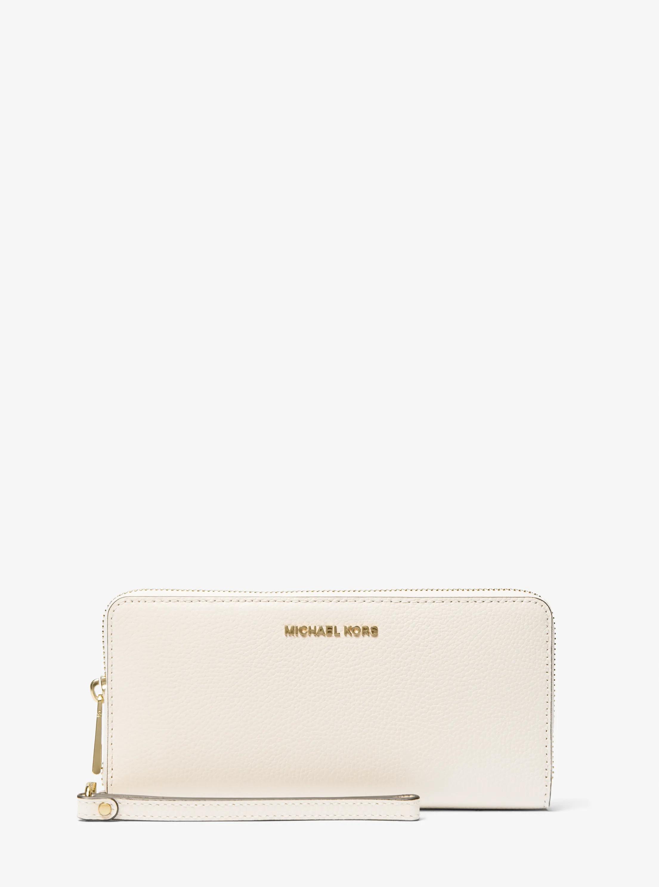Cartera continental Jet Set Travel grande de piel granulada in CREMA CLARO | Michael Kors