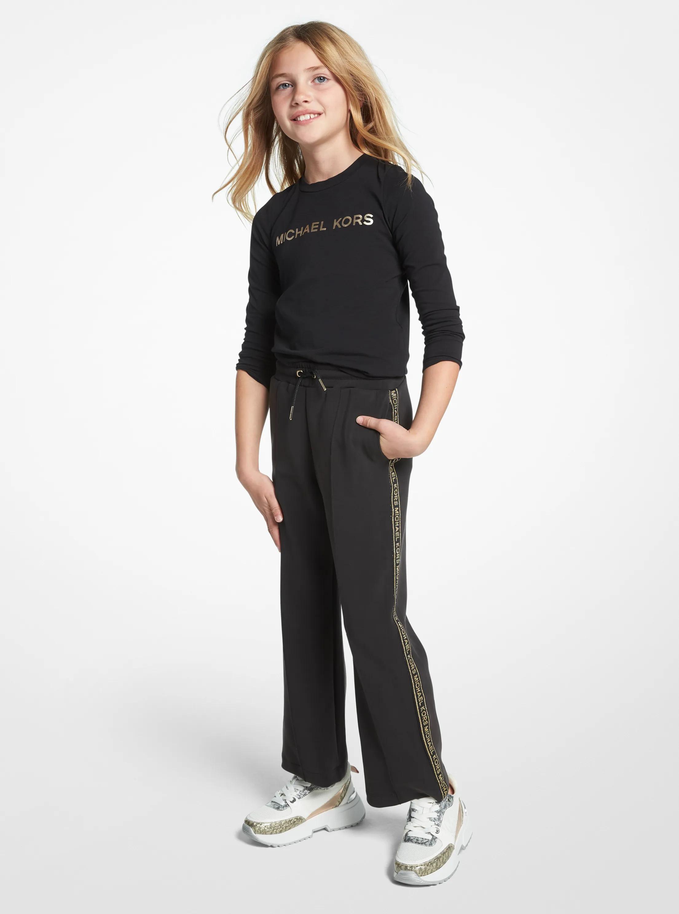 Pantal&oacute;n deportivo de punto el&aacute;stico con cinta de logotipo metalizada