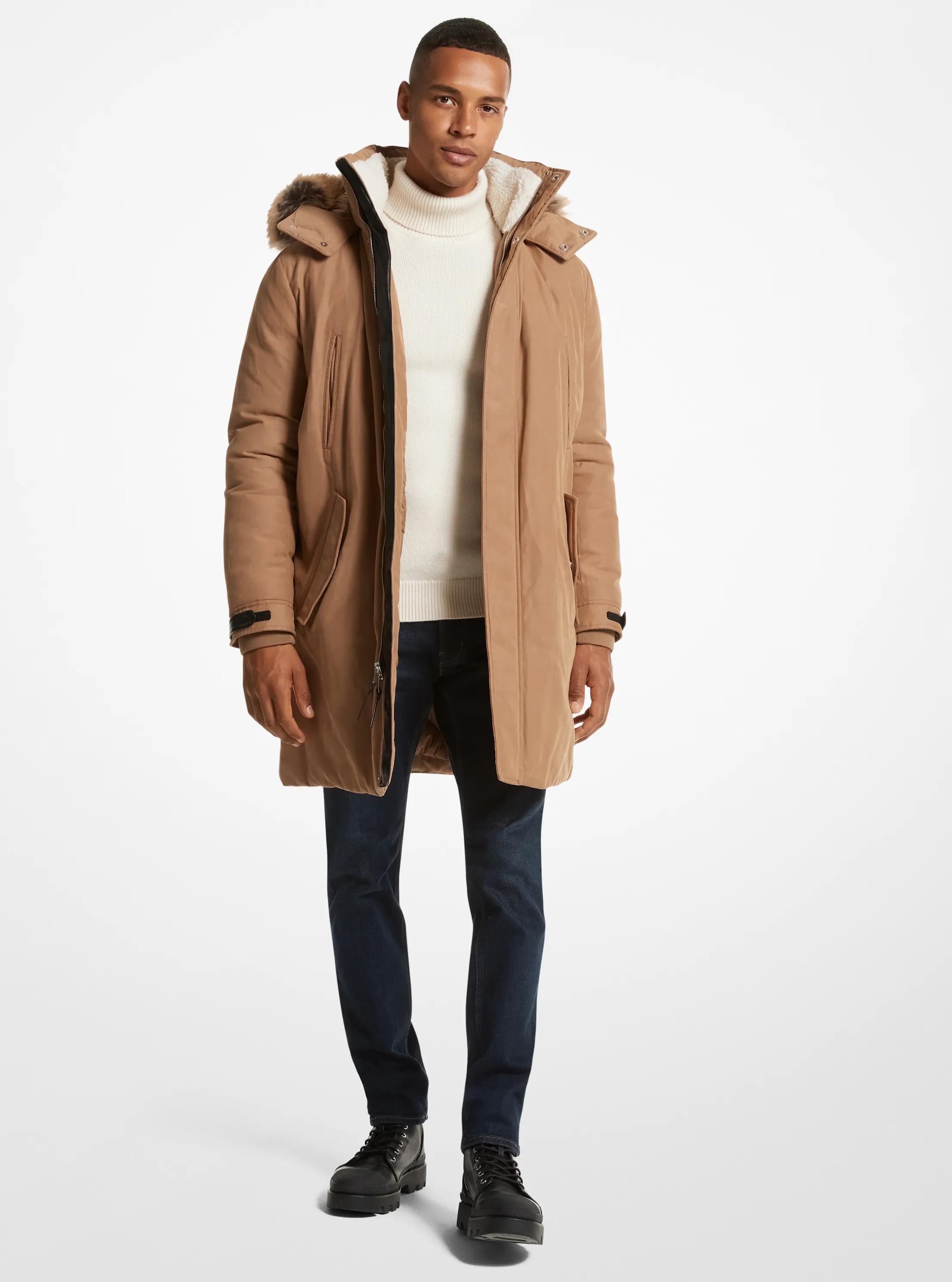 Parka tiss&eacute;e bord&eacute;e de fausse fourrure