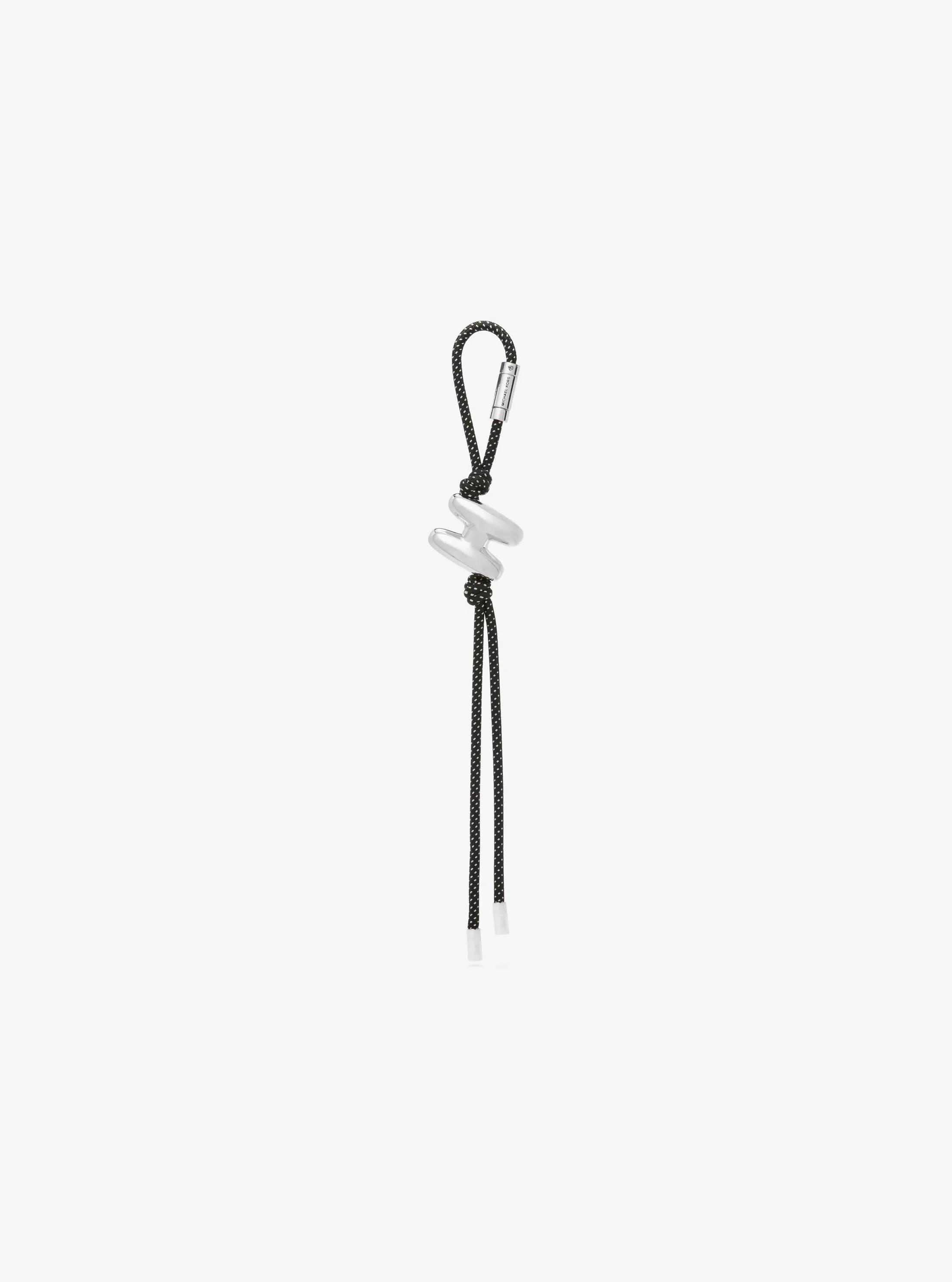 Adorno para bolso en tono plateado con cord&oacute;n moteado e inicial in RODIO | Michael Kors