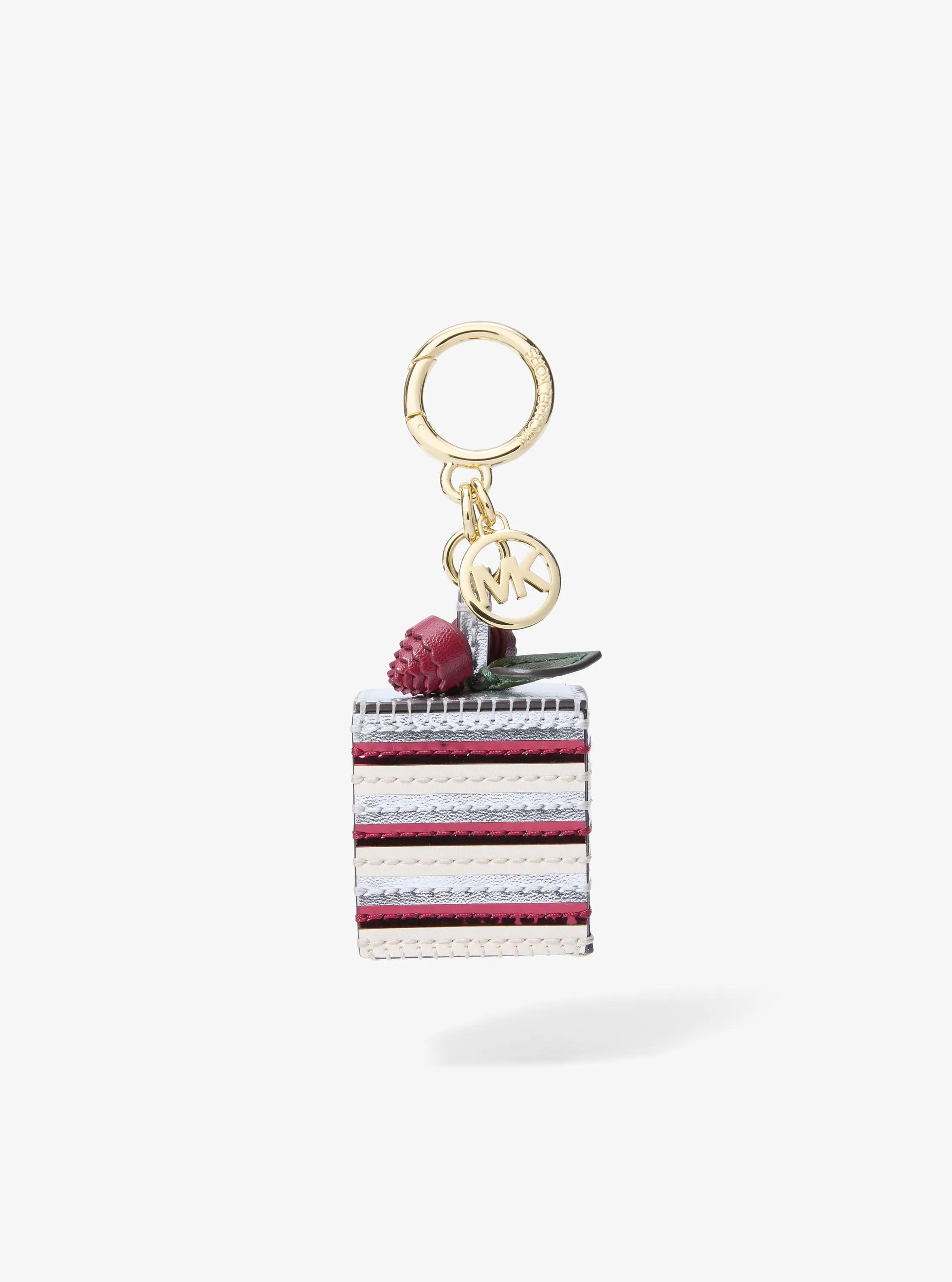 Colgante para bolso con forma de pastel in GRANATE | Michael Kors