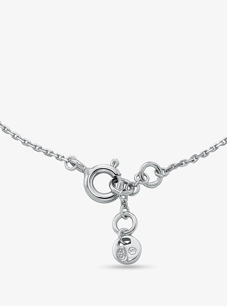 Bracciale in argento sterling placcato in metallo prezioso con pav&eacute; e logo Empire in ARGENTO | Michael Kors