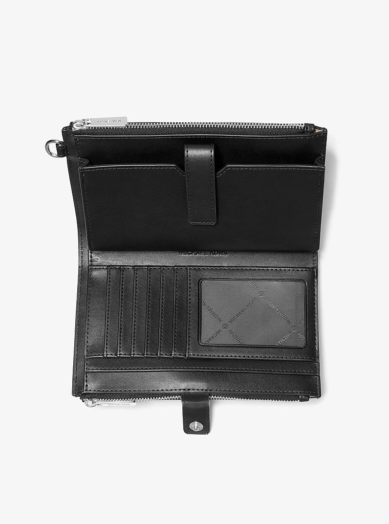 Grande pochette-bracelet Jet Set ombr&eacute;e &agrave; logo Signature in COMBINAISON NOIRE | Michael Kors