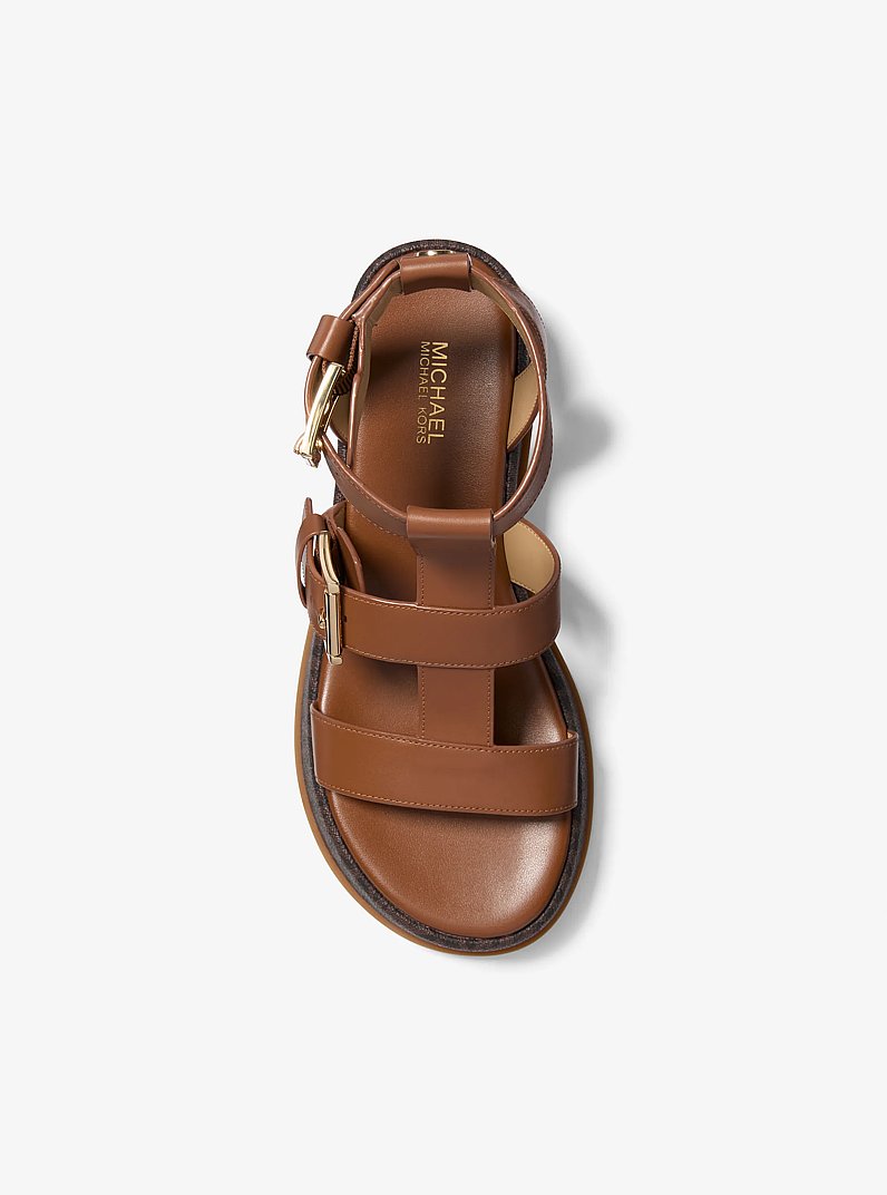 Sandalia gladiador Selah de cuero con plataforma y logotipo de la marca in MARR&Oacute;N | Michael Kors