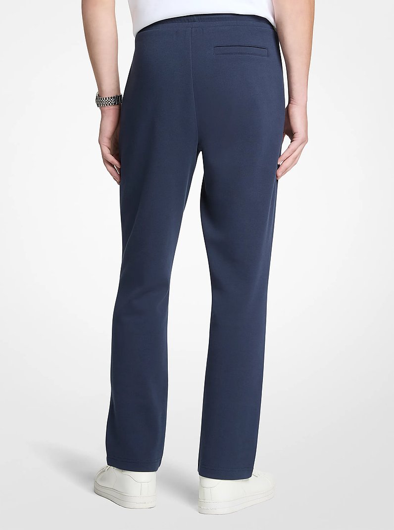 Pantalon tricot en m&eacute;lange de coton &agrave; logo in MINUIT | Michael Kors