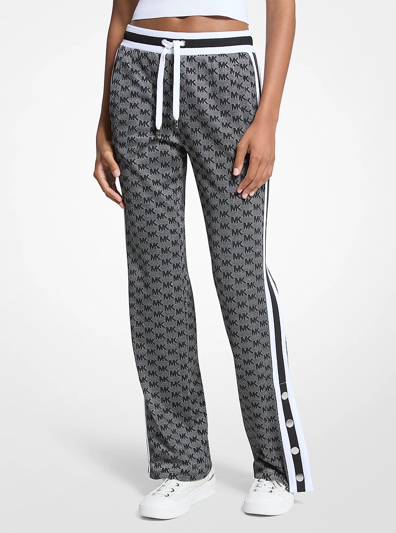 Logo Print Metallic Stretch Knit Track Pants in BLACK/SILVER