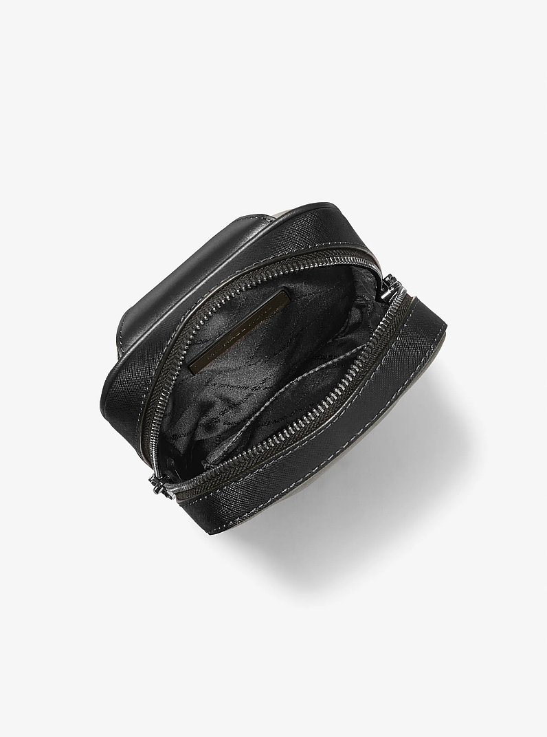 Ri&ntilde;onera bandolera Cooper mediana de piel in NEGRO | Michael Kors