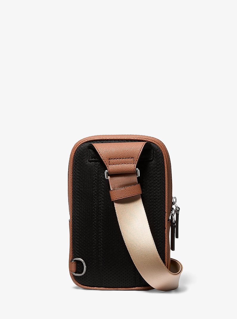 Cooper Logo Jacquard Sling Pack in LUGGAGE | Michael Kors