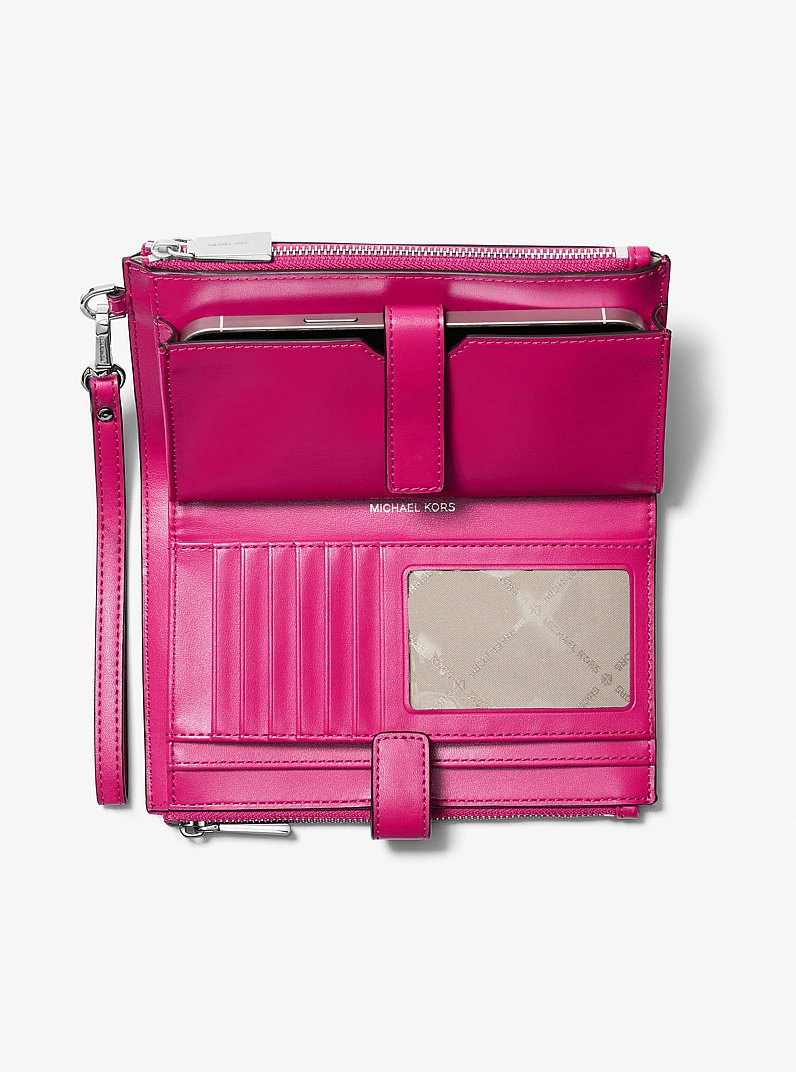 Jet Set Large Signature Logo Wristlet in WILD BERRY | Michael Kors