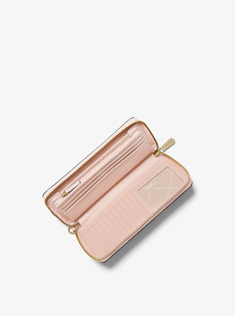 Billetera Jet Set Travel grande de piel granulada in ROS&Aacute;CEO POLVORIENTO | Michael Kors