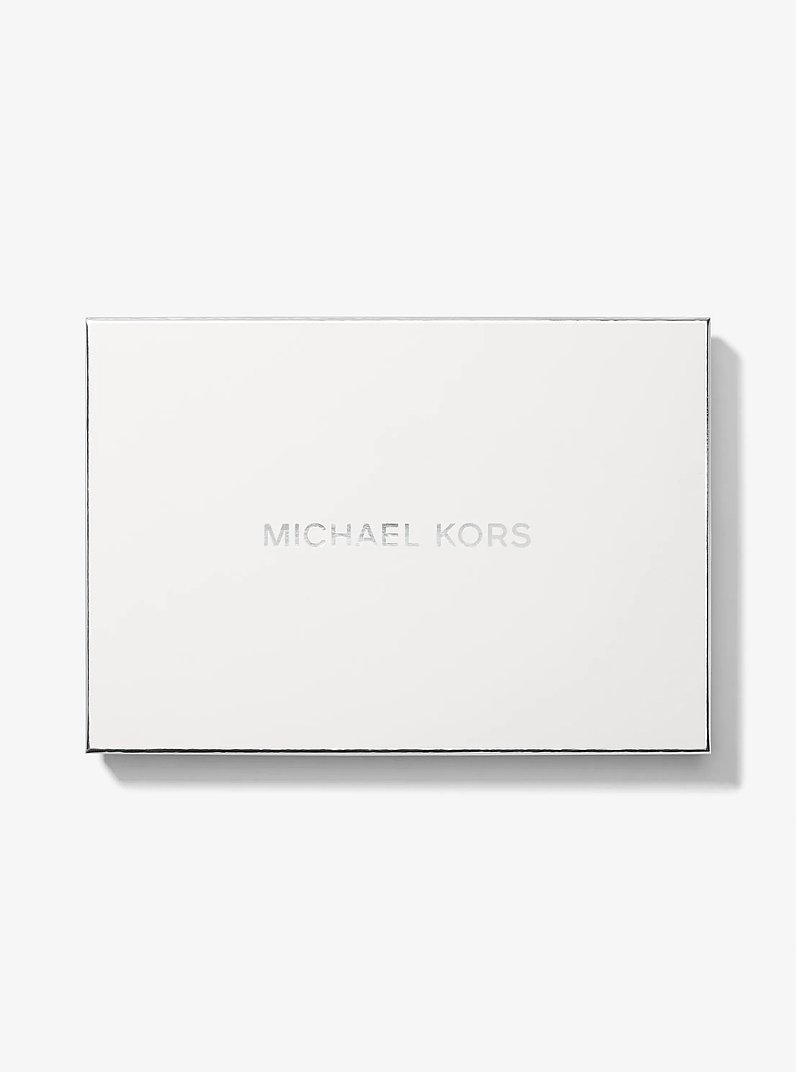 Gro&szlig;e Handgelenktasche aus gekrispeltem Leder in LUGGAGE | Michael Kors