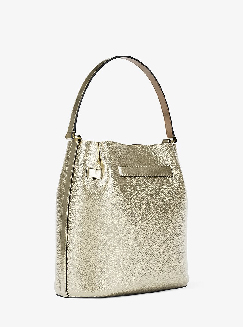 Carson Medium Metallic Convertible Bucket Crossbody Bag in PALE GOLD | Michael Kors