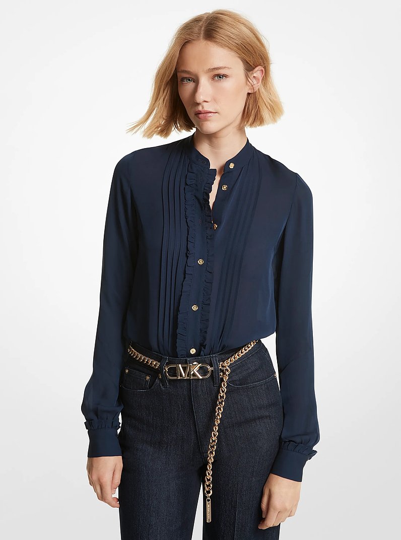 Blusa in georgette a pieghe con volant