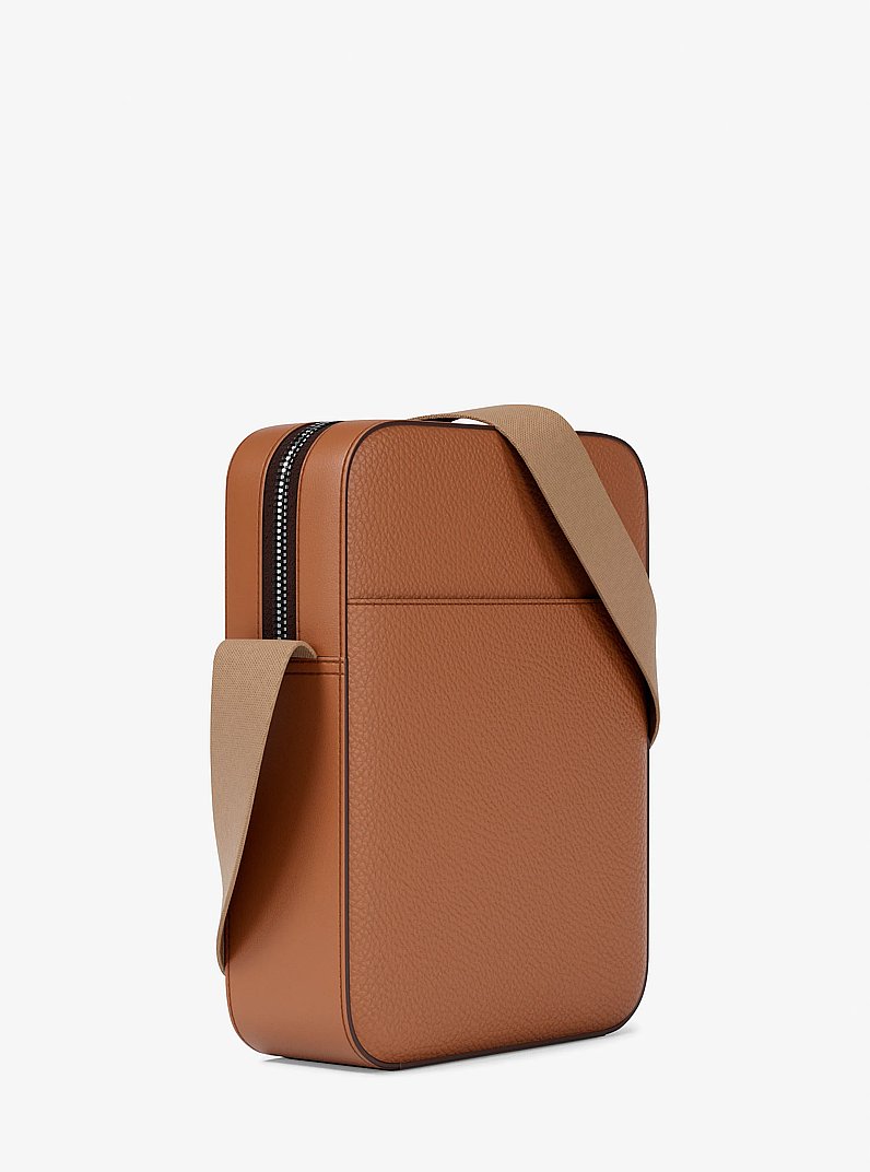 Cooper Logo Embossed Pebbled Leather Messenger Bag in LUGGAGE | Michael Kors