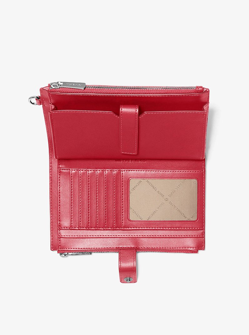 Grande pochette-bracelet Jet Set ombr&eacute;e &agrave; logo Signature in HISBISCUS MULTI | Michael Kors