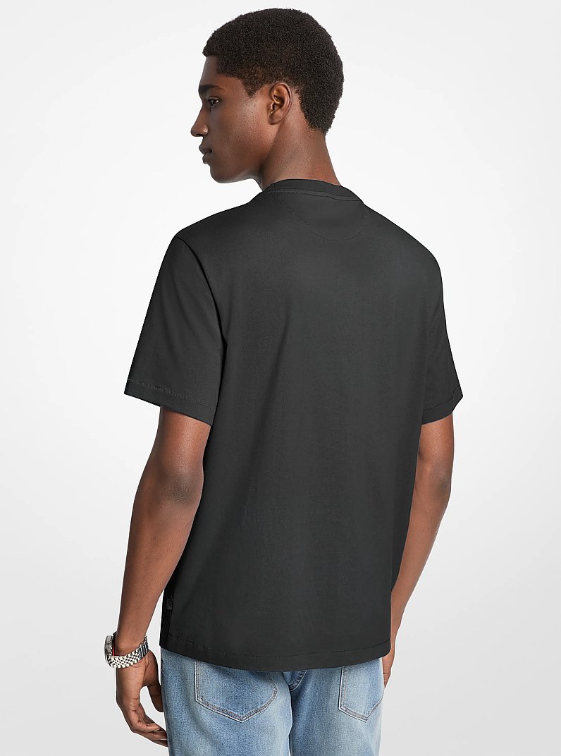 T-shirt in cotone con logo testurizzato in NERO | Michael Kors