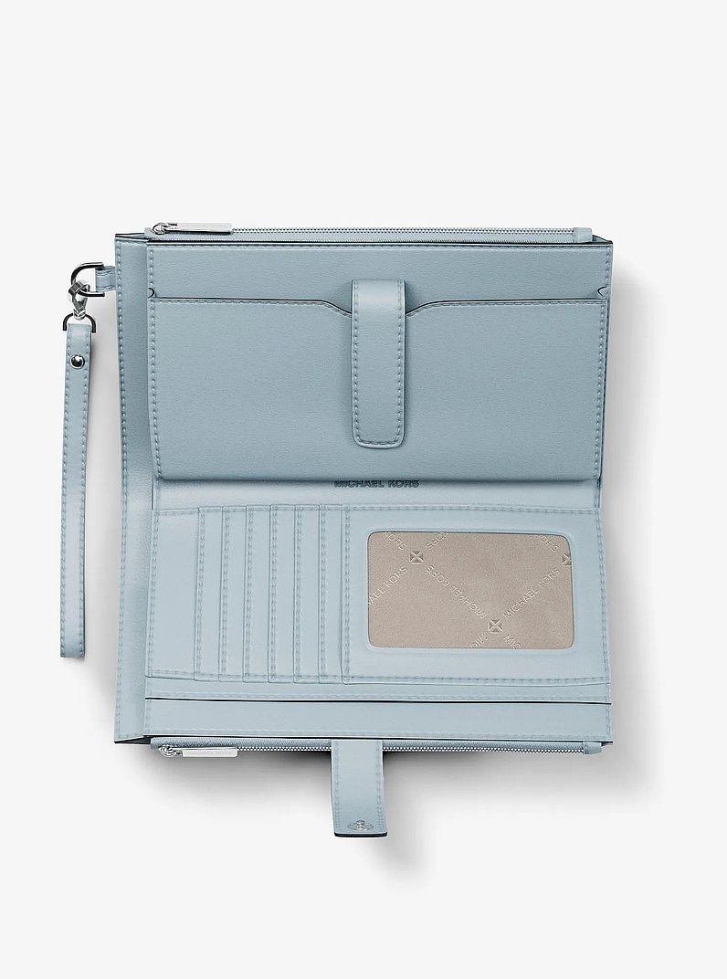 Jet Set Travel Large Printed Signature Logo Wristlet Wallet in PALE OCEAN | Michael Kors