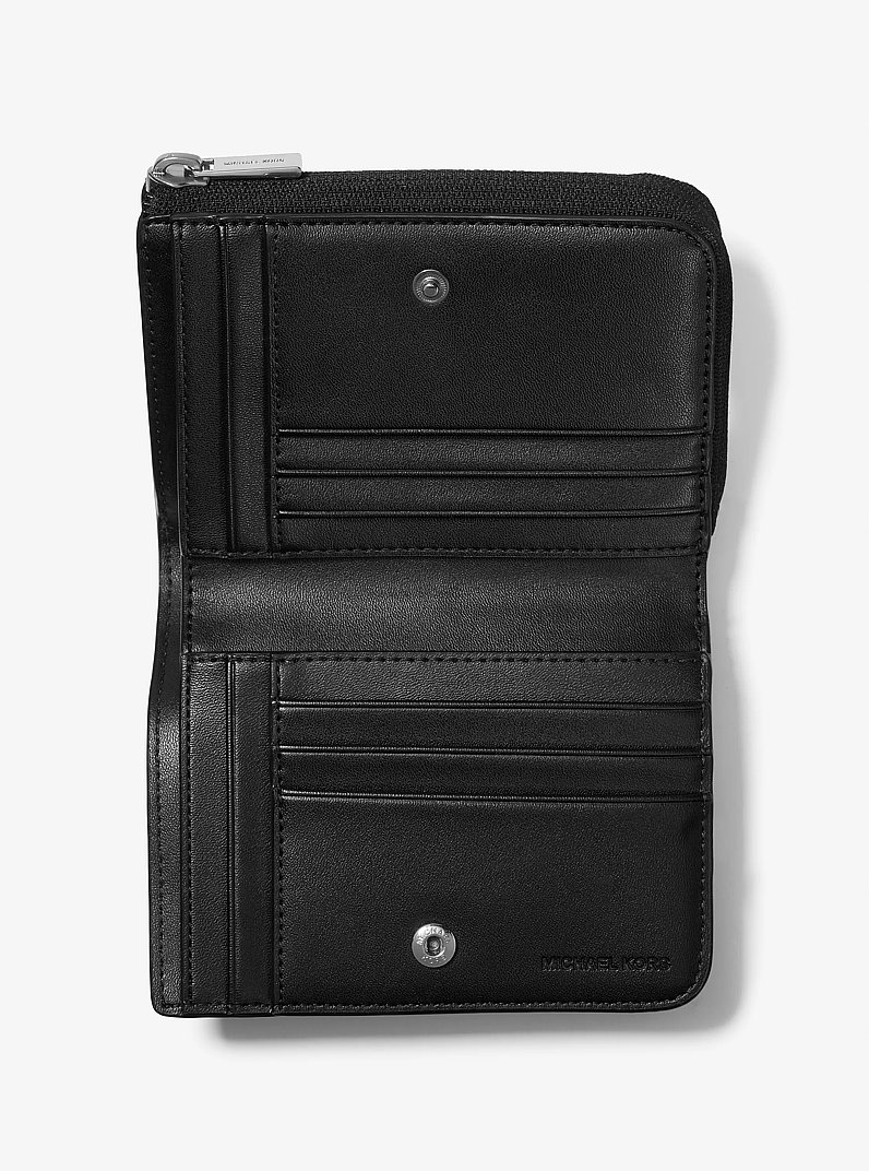 Billetera tipo folio Cooper con logotipo Signature in NEGRO | Michael Kors