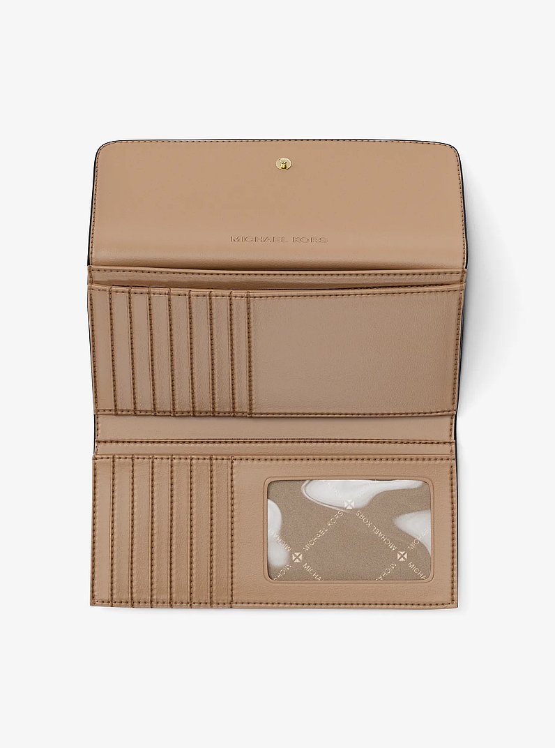 Jet Set Travel Large Signature Logo Tri-Fold Wallet in PALE GOLD | Michael Kors