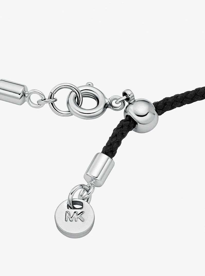 Bracciale in cordoncino con logo e pav&eacute; in NERO | Michael Kors