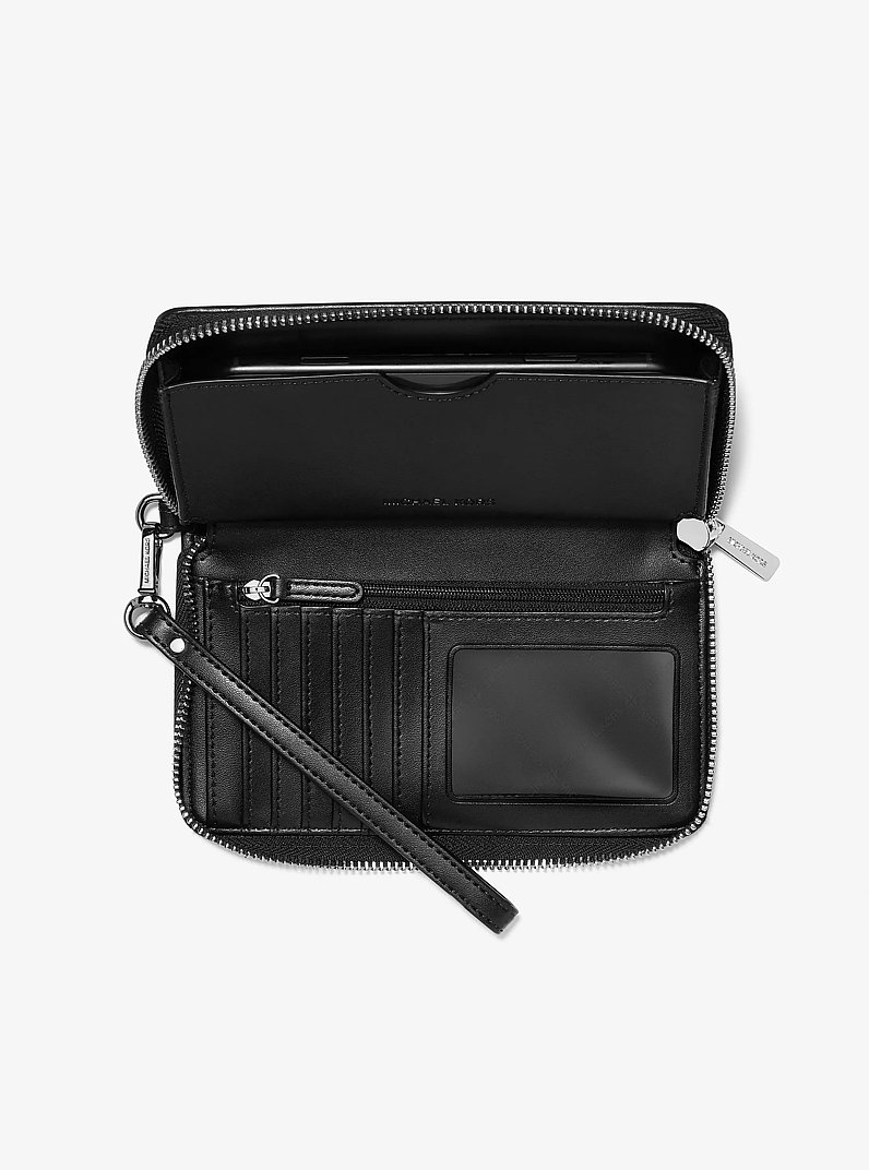 Bolso de pulsera Jet Set grande para tel&eacute;fono en jean lavado