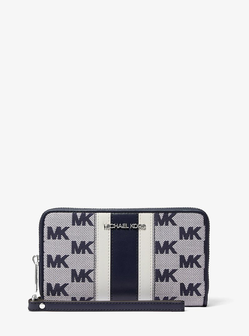 Grande pochette-bracelet Jet Set Travel ray&eacute; en jacquard &agrave; logo in BLEU MARINE | Michael Kors